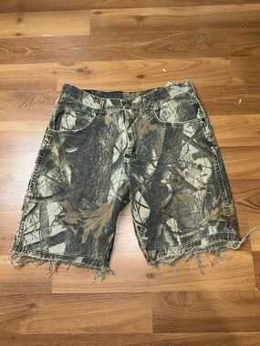 Vintage Wrangler Realtree camo denim cutoff shorts with frayed hem